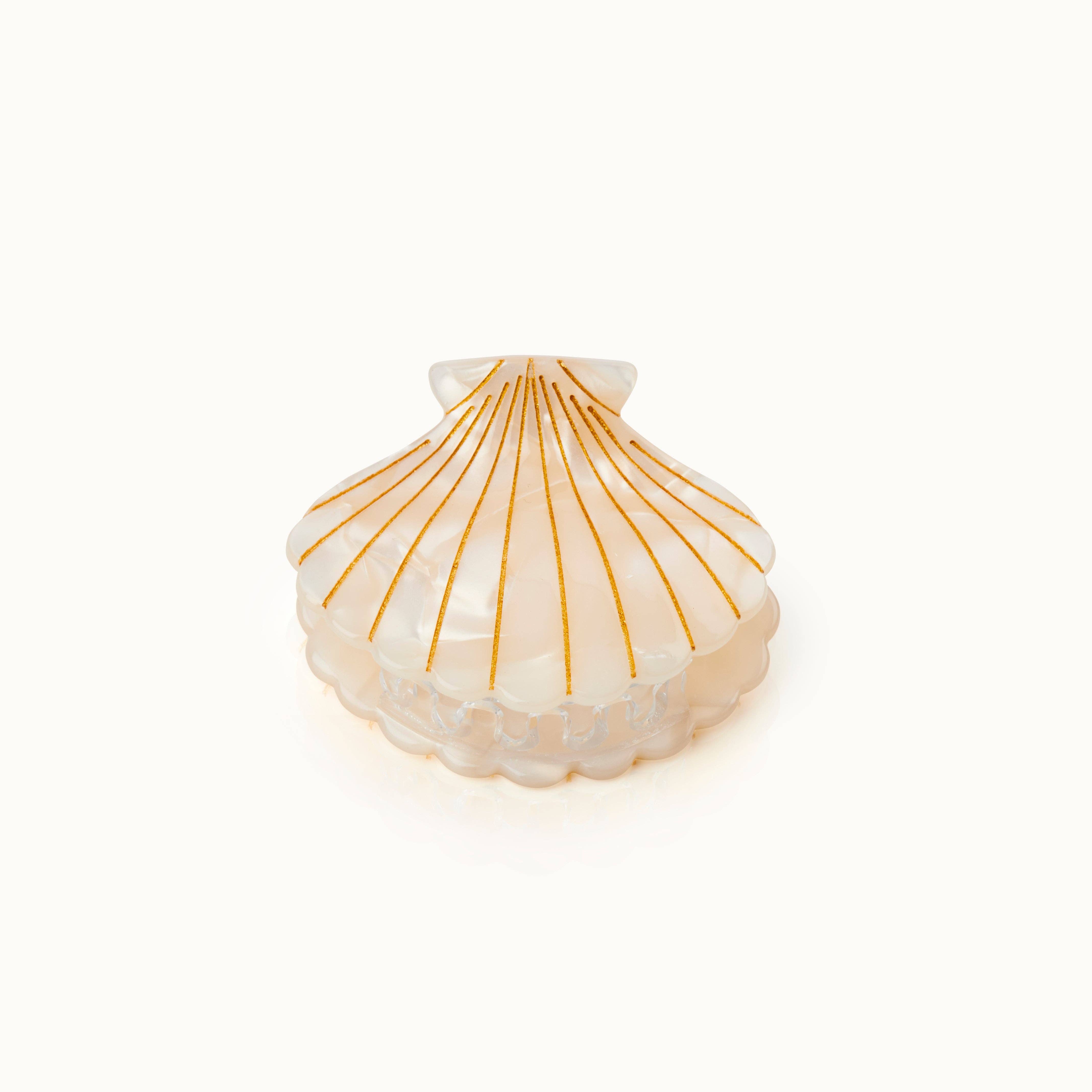 Barrette en forme de coquillage avec perle
