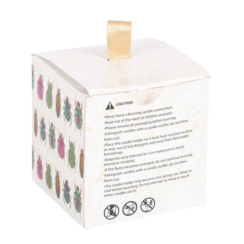 Bougie à imprimé scarabée ambre et vanille