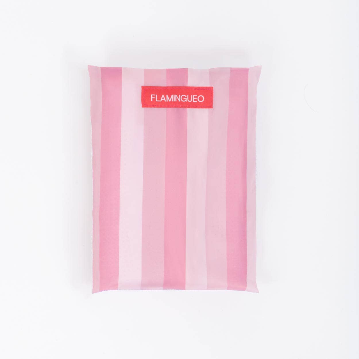 Serviette de plage rose en microfibre avec des aimants