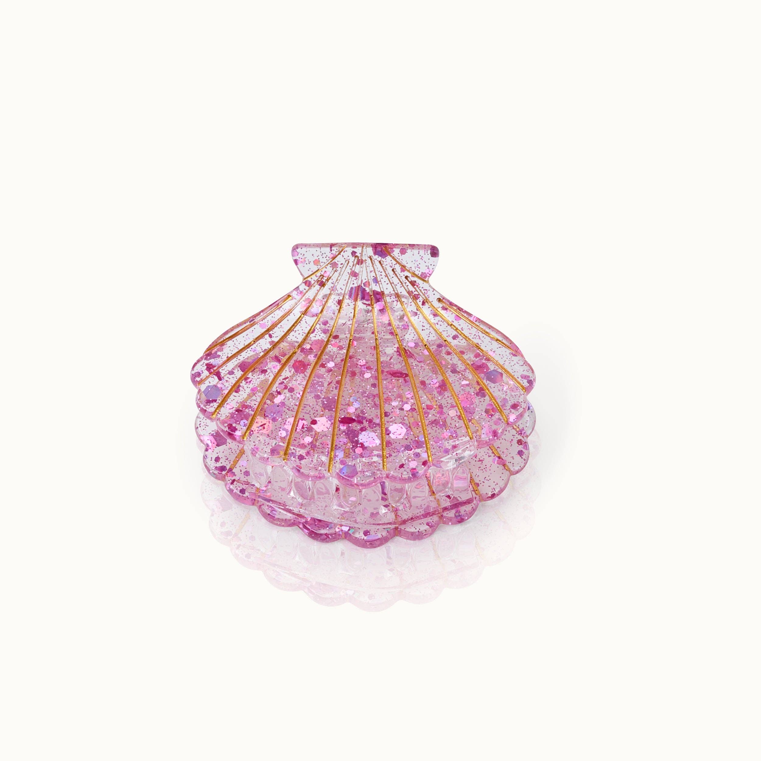 Barrette en forme de coquillage rose scintillant
