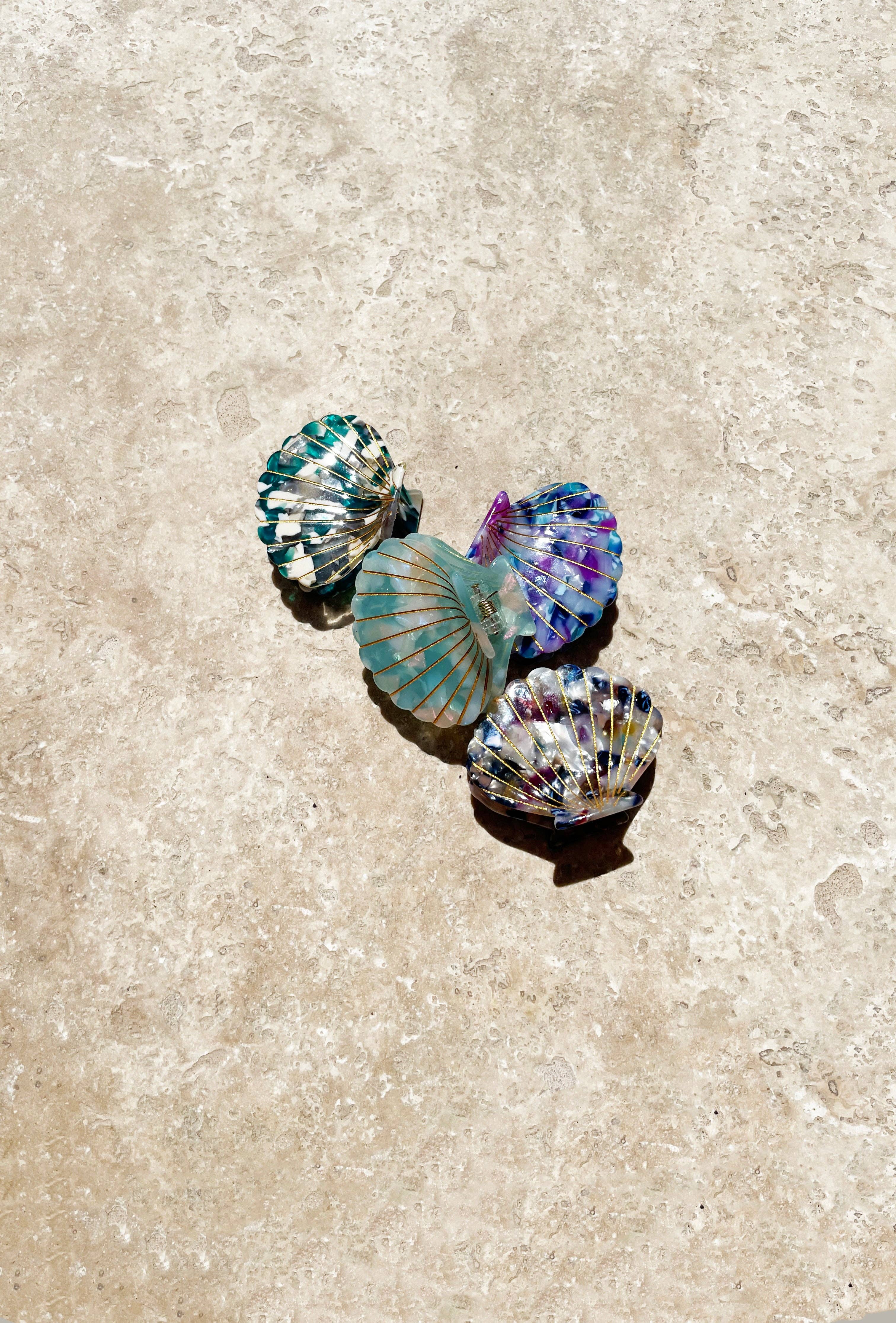 Pince à cheveux en forme de coquillage turquoise scintillant